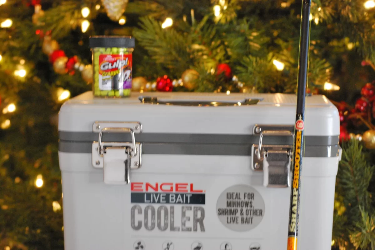 Berkley crappie nibbles, Engel cooler, & BnM Sharp Shooter fishing rod.